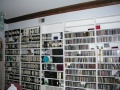 2 shelves of music VHS, middle shelf is Hi def and misc, then CDs.